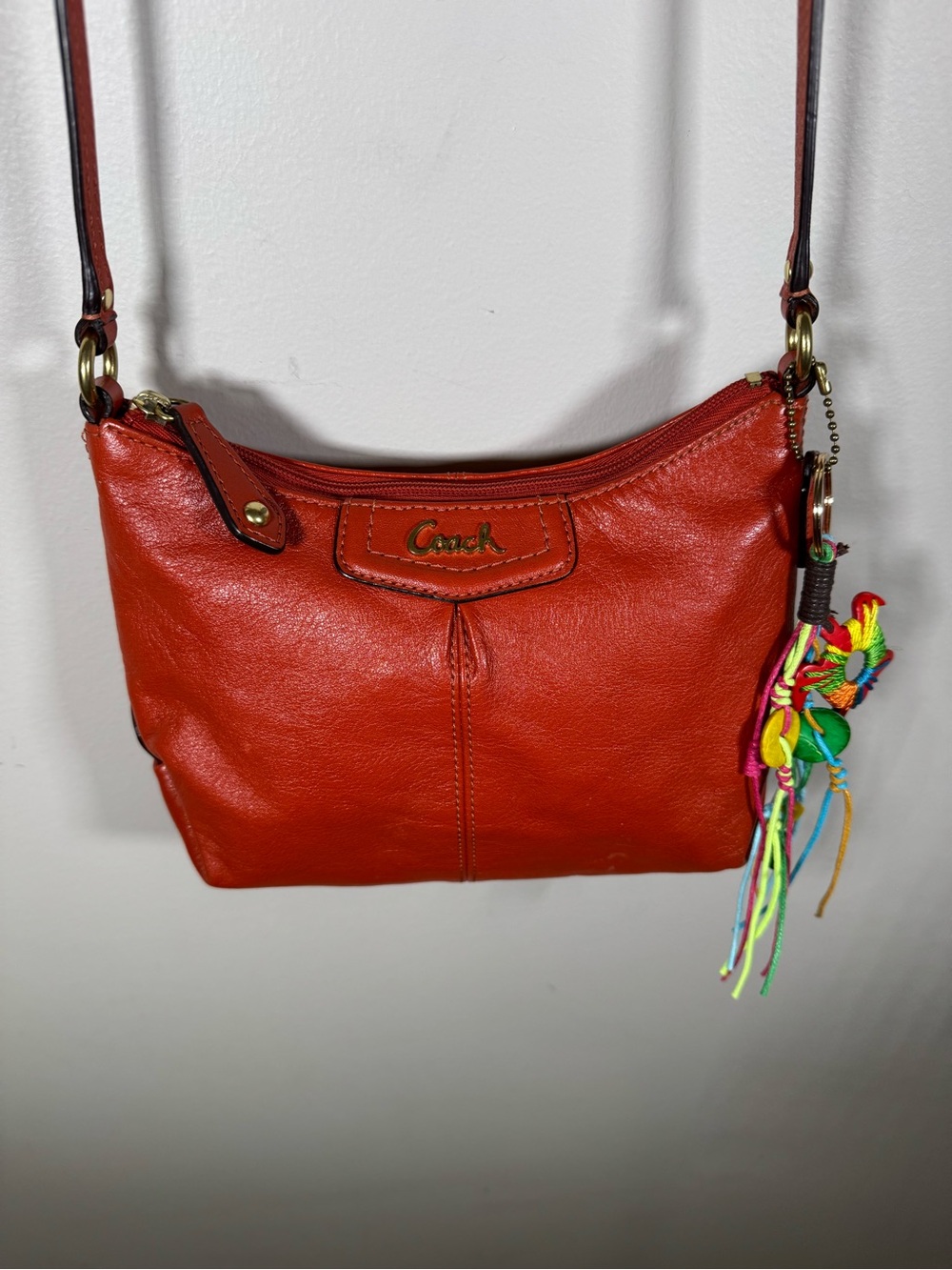 Coach Red-Orange Leather Crossbody with Multicolor Tassel